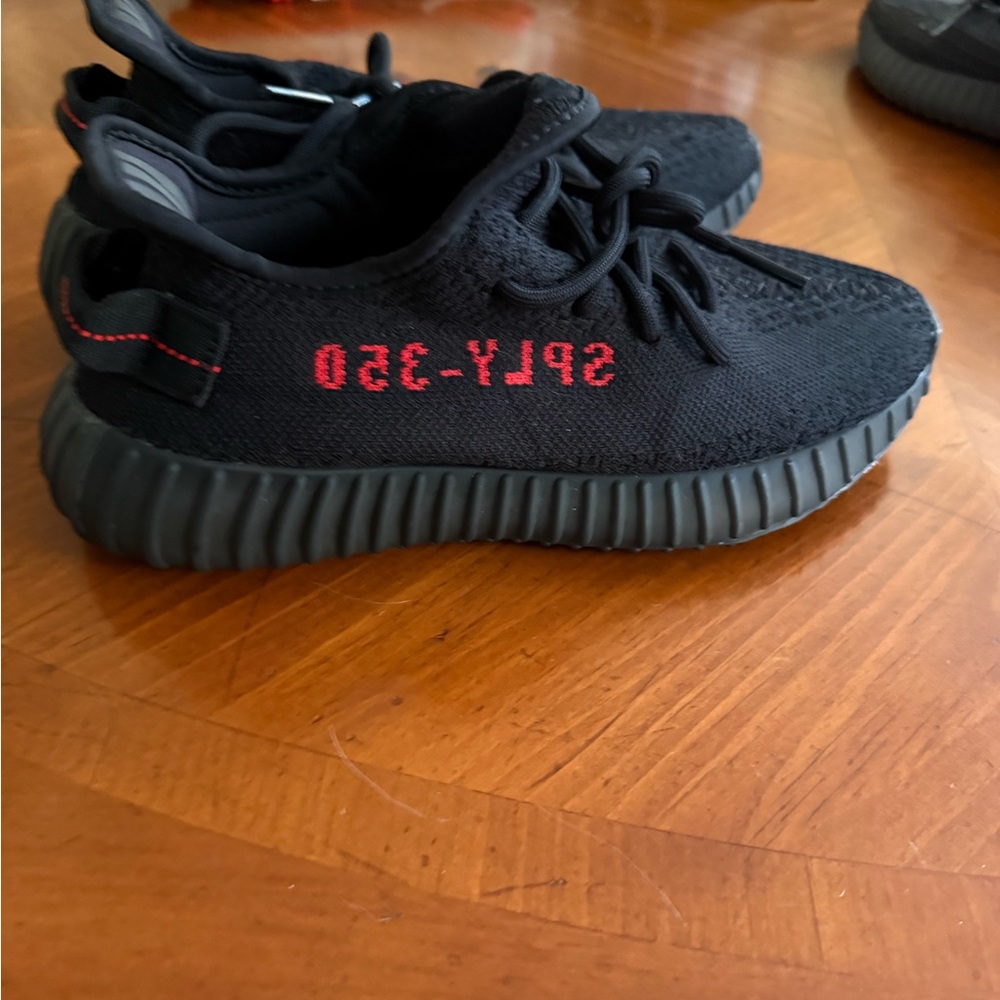 Adidas Yeezy Boost 350 V2 Core Black/Red (Bred) sneaker.
